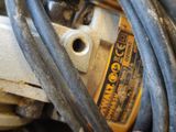 a close up of a motor with wires attached to it