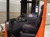 an image of a fork lift truck in a warehouse