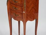 an image of a small wooden table with a marble top