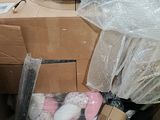a box full of stuff that is sitting on the floor