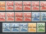 a close up of a group of stamps with numbers on them