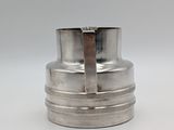 an antique silver plated cup on a white background