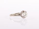 an old cut diamond ring with a single stone in the center