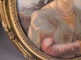 a painting of a woman holding a flower in her hand