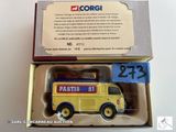 un camion miniature dans une boîte avec une étiquette de prix