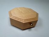 a small wooden box that is on a table