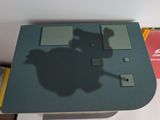a shadow of a person on a computer screen