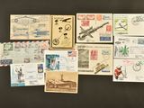a lot of stamps and postcards on the table