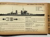 an old book with a picture of a battleship on it
