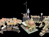 a lot of miniature buildings that are on a black background