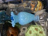a basket full of empty glass bottles and other items