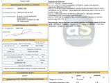 un gros plan d'un document sur lequel figure la photo d'une voiture
