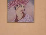 painting of a woman with a pink turban on a tan wall