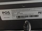 a close up of a laptop with a cable on it