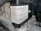 a picture of a close up of a car ' s engine