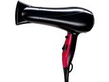 a black and red blow dryer on a white background