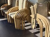 a lot of chairs that are lined up in a row