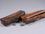 two wooden boxes that are sitting next to each other