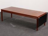 an image of a wooden bench in a room
