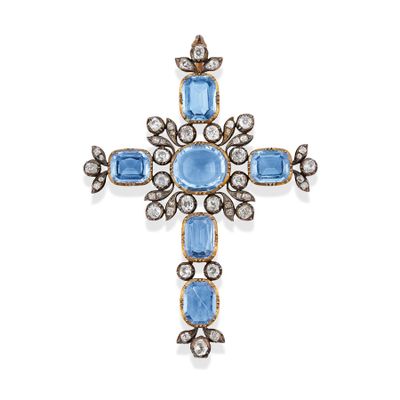 a diamond and aquamarinee cross pendant
