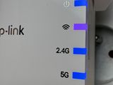 a close up of a wifi router on a table