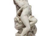 an image of a statue of a woman holding a cross on a pedestal