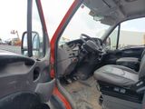 a picture of the inside of a truck with the driver ' s seat up
