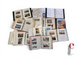 a lot of books that are sitting on a table