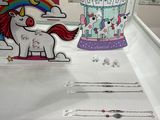 a display of bracelets and necklaces in a store window