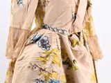 an image of a woman ' s dress on a mannequin mannequin