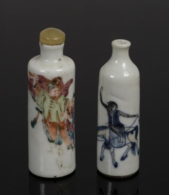 two small vases that are sitting on a table
