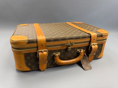 louis vuitton monograme suitcase with leather handles