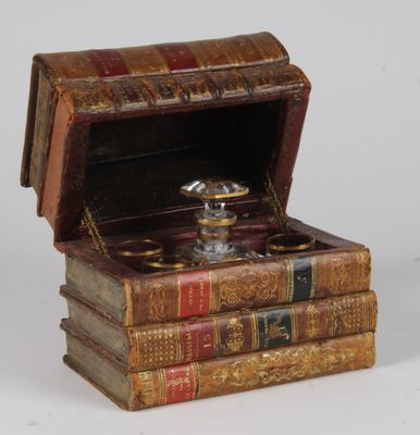 a wooden box with a ring inside of it