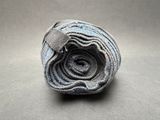 a rolled up piece of fabric on a table