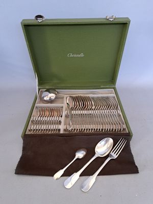 silverware in a green case with spoons, forks, and spoons