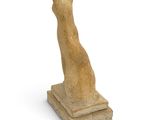 statue of a cat sitting on a pedestal on a white background