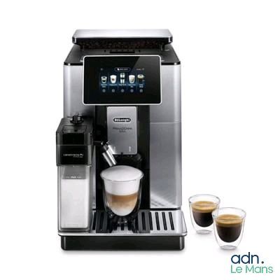 une image d'une machine à café avec deux tasses de café