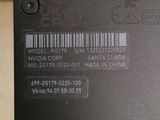 the back of a black laptop with a bar code on it