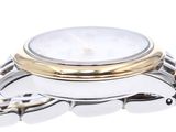 an image of a close up of a watch on a white surface