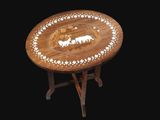 a wooden table with a picture of a horse on it