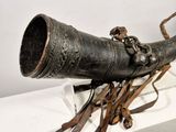 a large metal object that is on display on a table