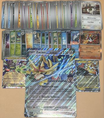 de nombreuses cartes Pokémon différentes accrochées au mur