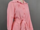 a woman ' s pink jacket on a mannequin mannequin mannequin mannequin mannequin mannequin mannequin mannequin