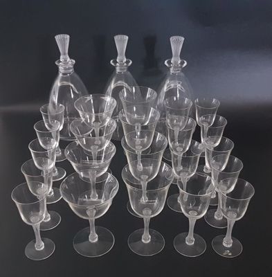 a lot of empty wine glasses on the table