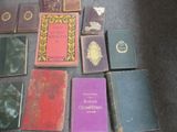 many books that are sitting on a table
