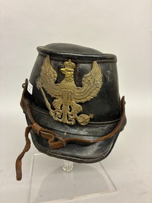 helmet of a soldier with a golden eagle on it