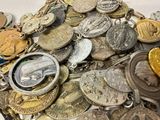 a pile of coins that are sitting on a table