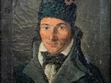 portrait of a man in a turban and a bow tie