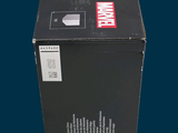 a black box that is sitting on a blue surface