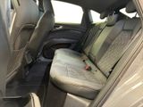 the back seat of a car with a seat belt in the back of it